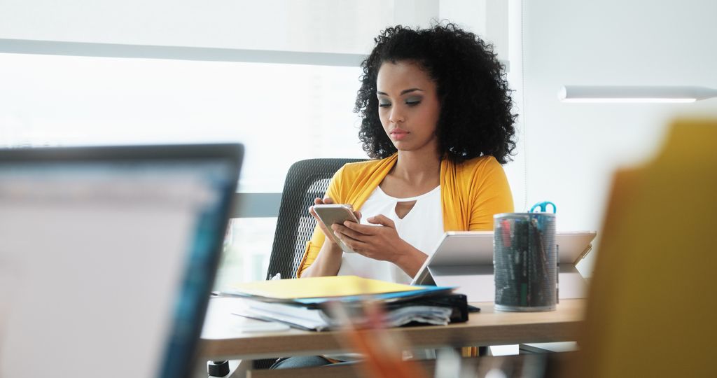 african-american-business woman reading email
